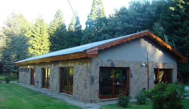 Cabanas y hosteria aldea los huemules