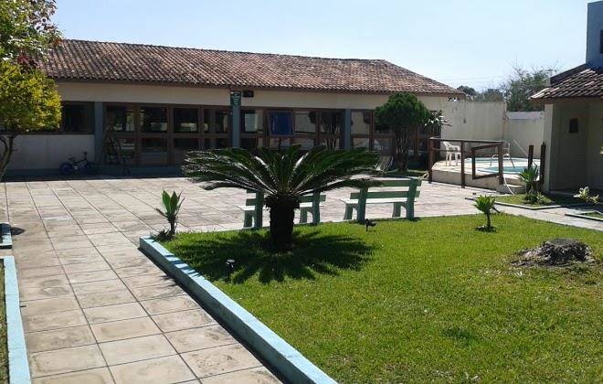 Centro de eventos e pousada capao novo adjori