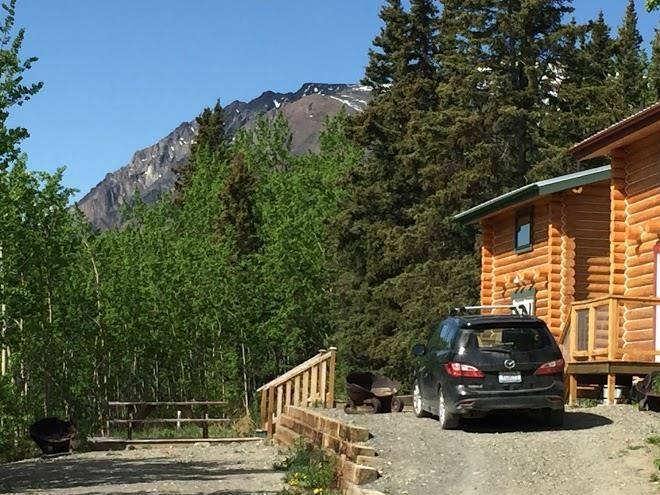 Cabins over crag lake