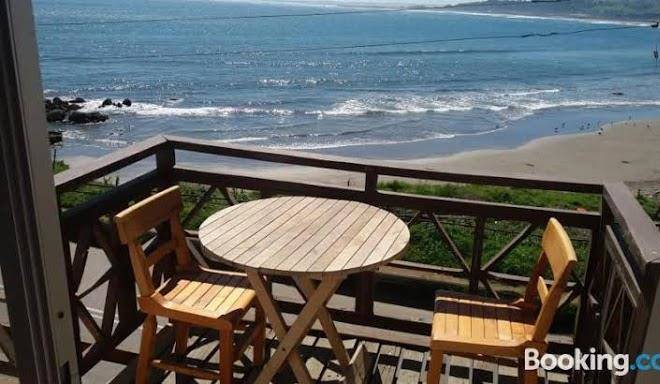 Cabanas pinguino en la roca