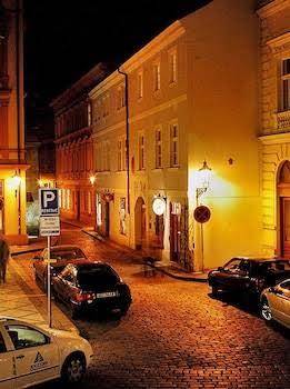 U Cervene Zidle Red Chair Hotel Image