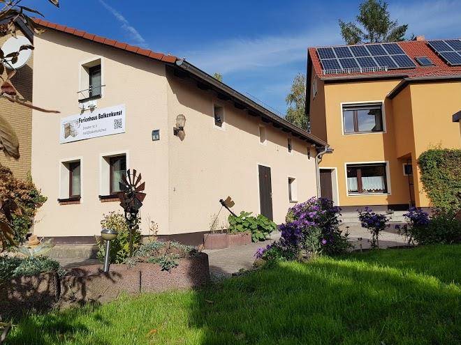 Ferienhaus balkenkunst