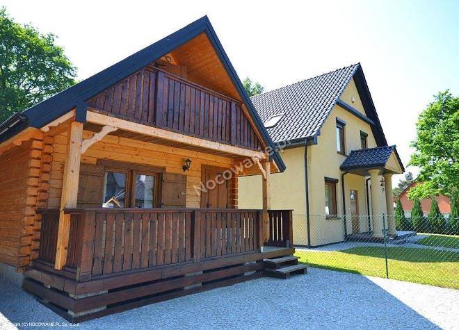 Domki i pokoje de luxe