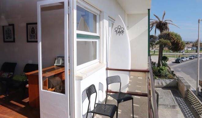 Peniche housing by tree the company