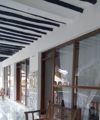 Blue and white beach bungalows