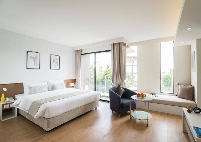 Aster Hotel & Residence Image