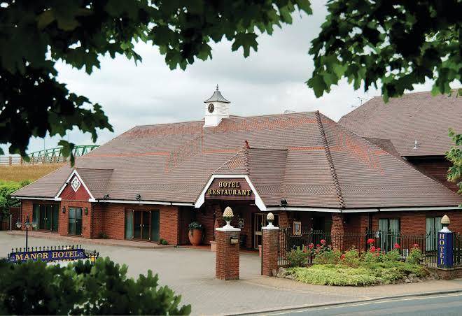 Best western manor hotel and suites