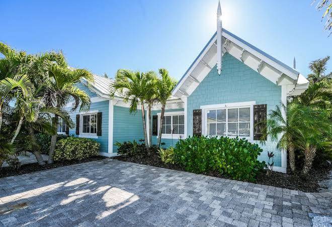 Mermaids crossing beach vacation home