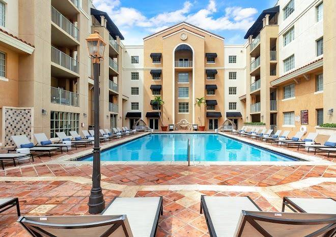 Dharma home suites coral gables at grand plaza