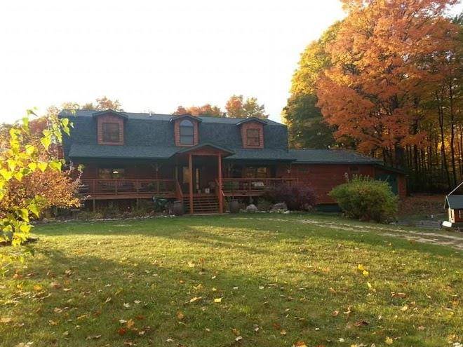 Torch Lake Country Inn B&b Image