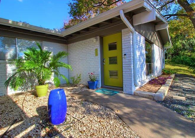 Soco spaces travis heights modern olive door