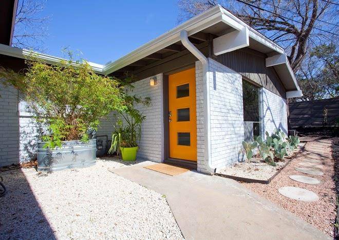 Soco spaces travis heights modern gold door