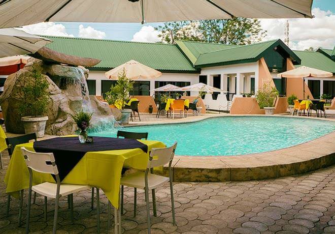 Le Dolphin's Grand Paradiso Hotel & Restaurant Image